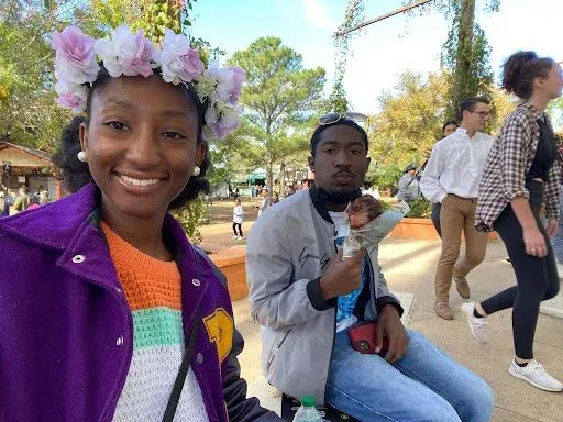 Young adults smiling together on a bright day out in Texas.